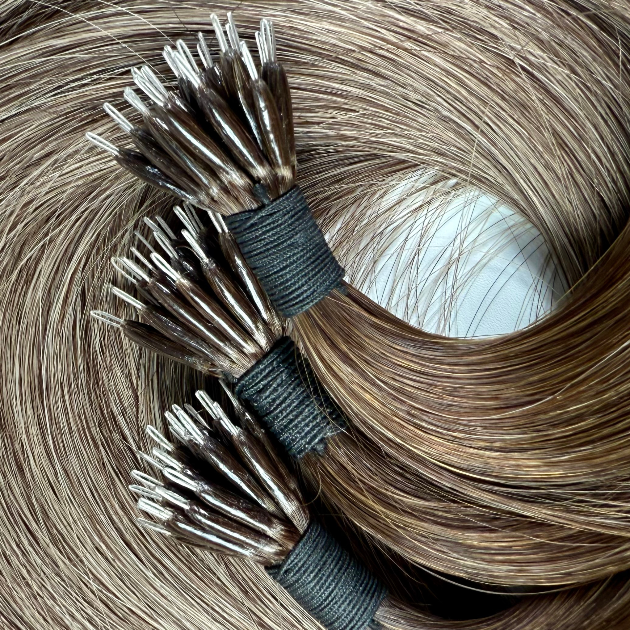 HAIR EXTENSIONS